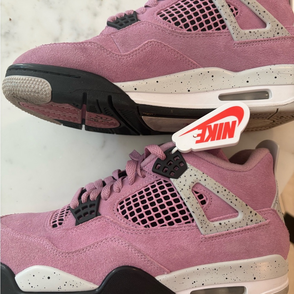 Nike Jordan’s 4 Retro Orchid women’s sneakers